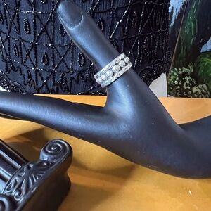 This SZ 6.5 Intricately engraved ball and rope ring band is 925 Sterling Silver